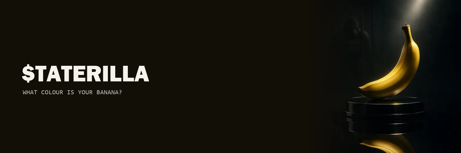 The $TATERILLA wordmark beside a single banana lit on a black plinth